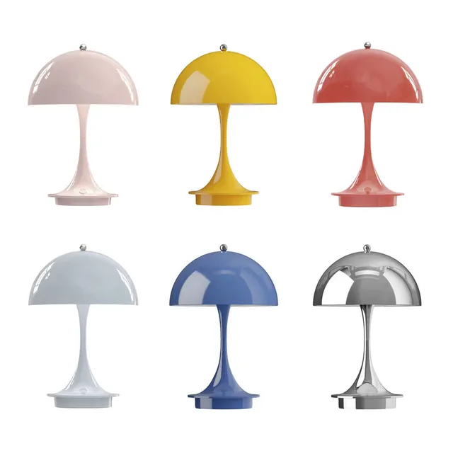 Louis Poulsen Panthella Portable Lamp with white shade and round base.