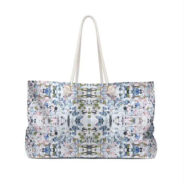 Structured tote with double handles and polished hardware.