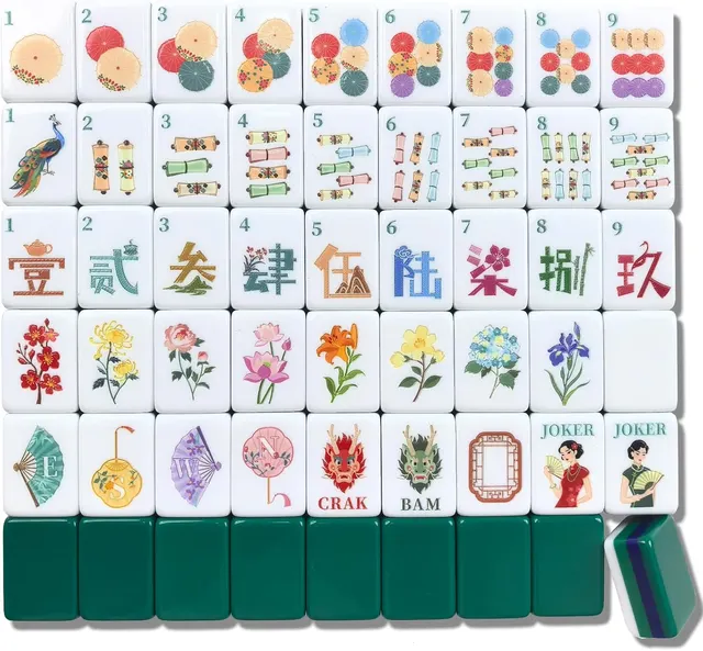 Dark green classic mahjong tiles with ivory faces and black markings.