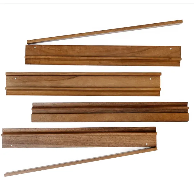 Set of four dark walnut wooden Mahjong racks with smooth grain.