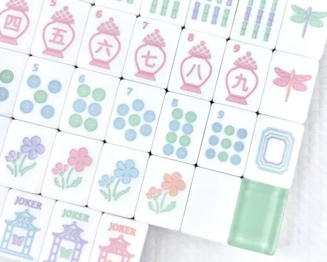 Garden Party Sea Glass Green ceramic mahjong tiles with frosted glaze.