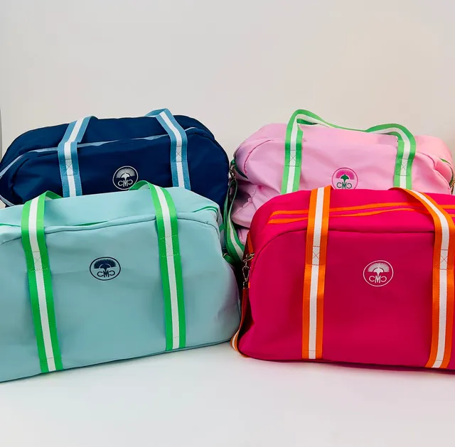 Club Tote Bag by Charleston Mahjong Club in assorted colors.