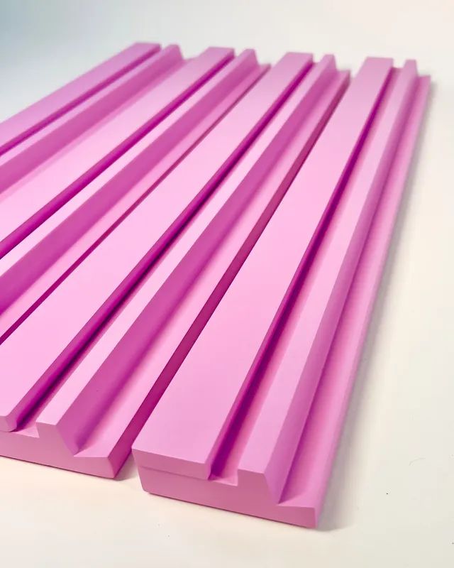Pink wooden rack, 20 inches tall, with rounded edges.
