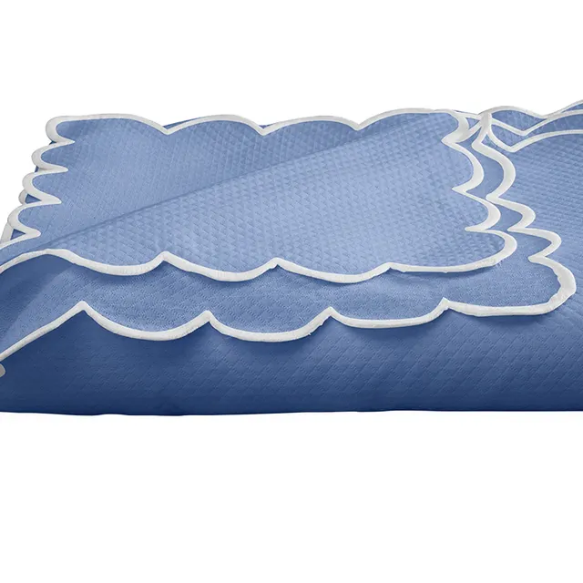 Matouk Savannah Gardens AzureBlue Tablecloth with scalloped edge and diamond pique.