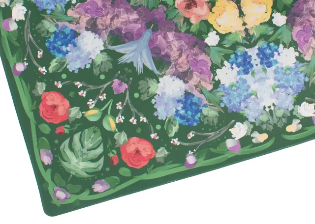 Green Garden Party Mat with leafy motif and grid.