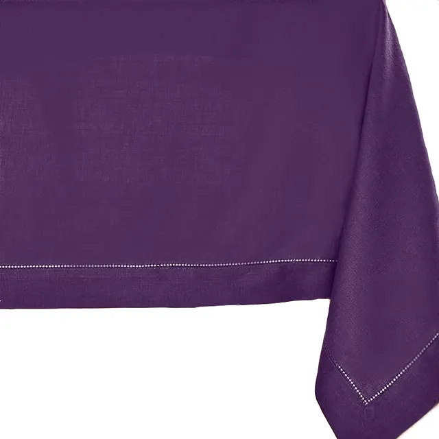 Purple linen tablecloth with natural texture and clean edges.