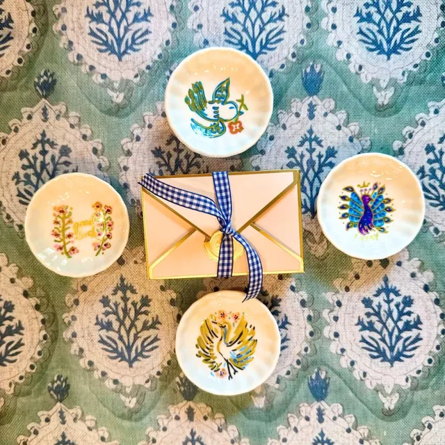 Handpainted ceramic dice dish with colorful patterns and varied motifs